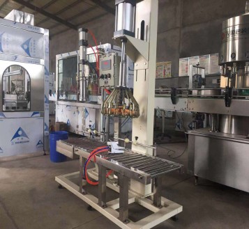 FILLING AND CAPPING MACHINE